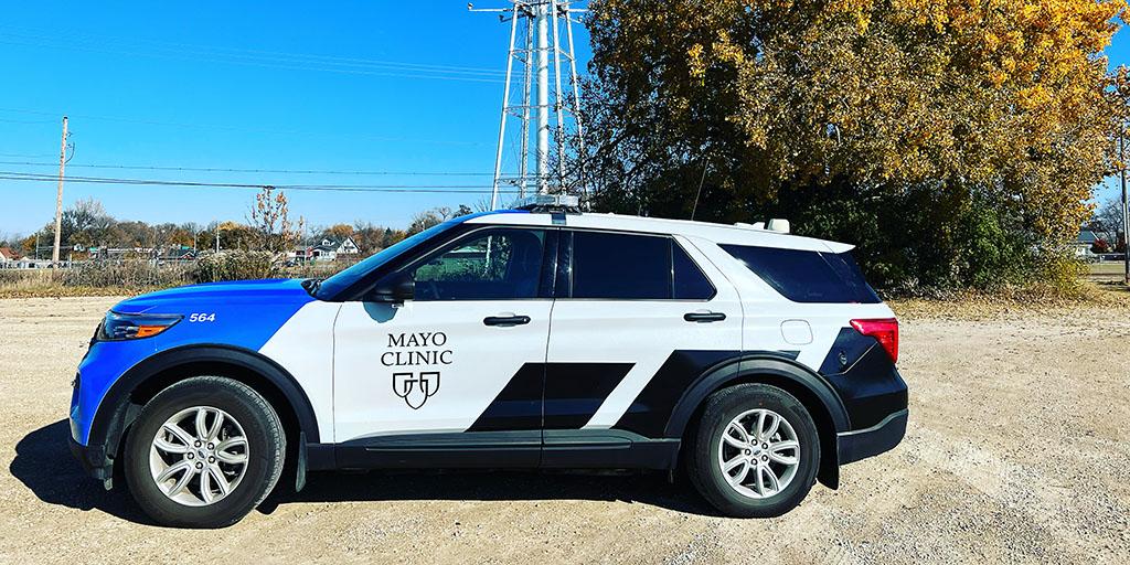 Mayo Clinic Ambulance vehicle in the middle of a road in a rural area