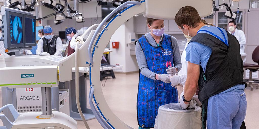 Residents working with ultrasound equipment