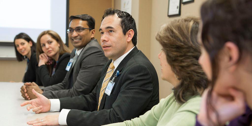 Endocrinology fellows in a meeting.