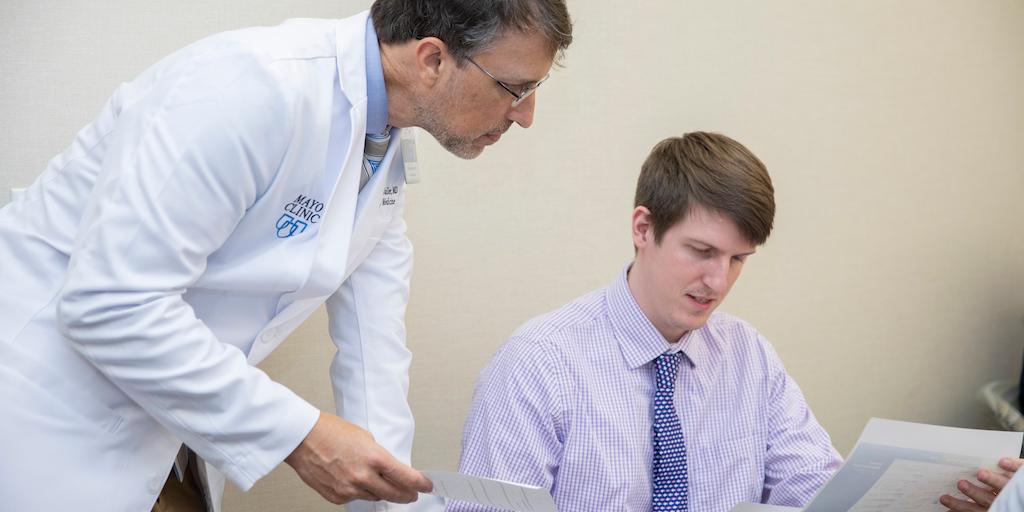 A core faculty member discusses didactic material with a family medicine resident at Mayo Clinic in Jacksonville, Florida.