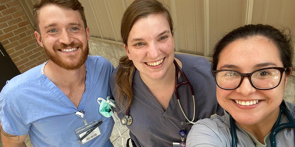 Family Medicine residents pose for a group photo outside in front of a building at Mayo Clinic in Mankato, Minnesota.