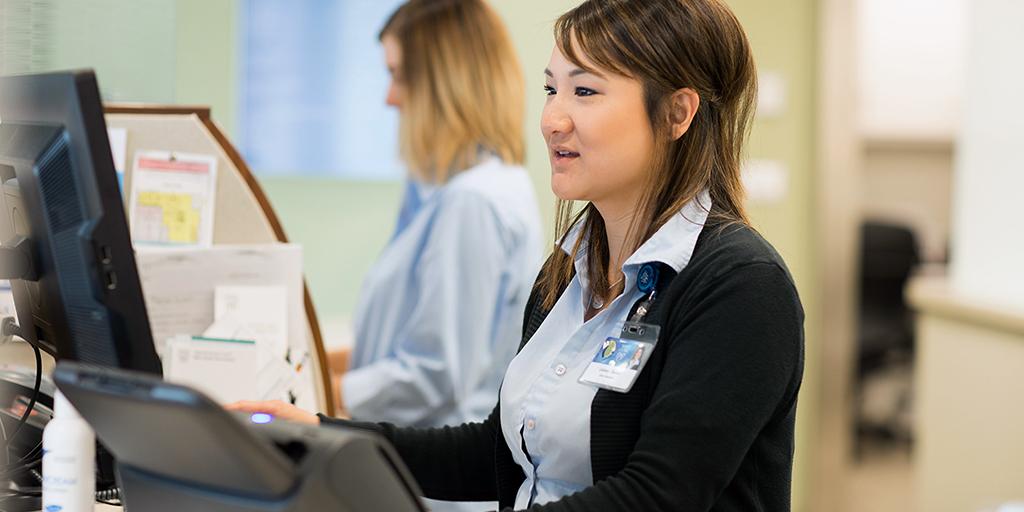 A Mayo Clinic family physician working on a computer