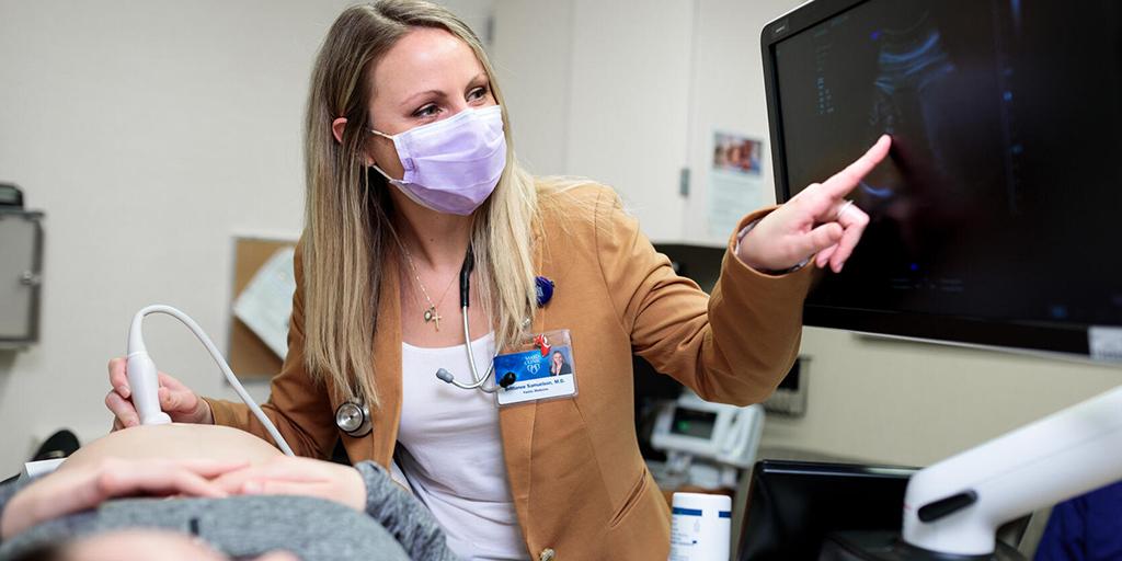 A Mayo Clinic Family Medicine resident performing an ultrasound