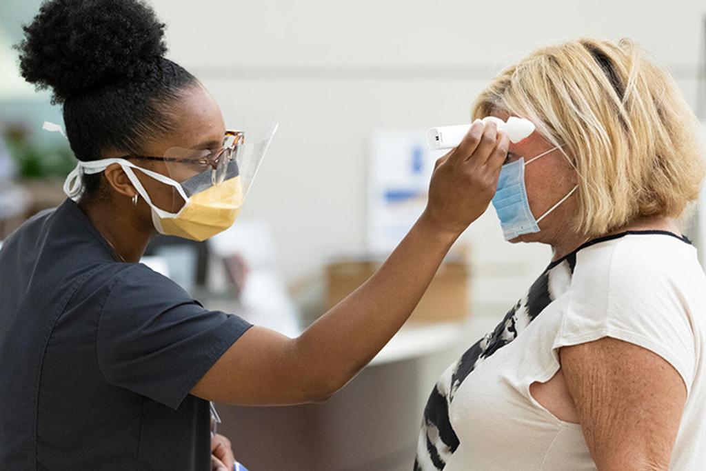 Infectious diseases doctor working with a patient at Mayo Clinic in Jacksonville, Florida.