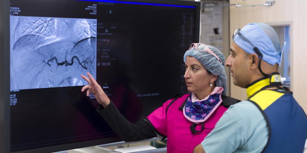 Interventional Radiology residents working together in the operating room at Mayo Clinic in Phoenix, Arizona.