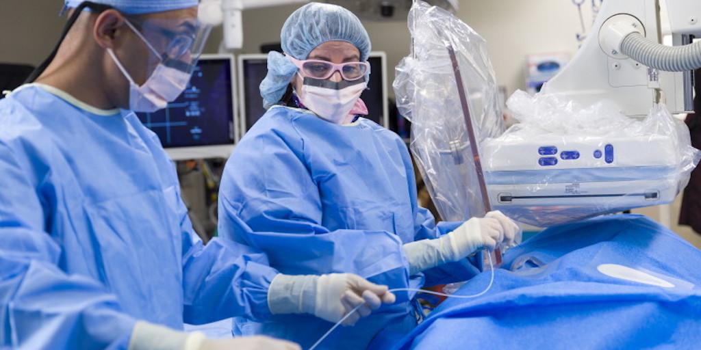 Interventional Radiology residents working together in the operating room at Mayo Clinic in Phoenix, Arizona.