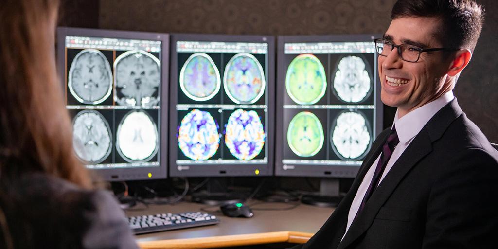 Faculty and fellow speak about a patient in the Neuroradiology Fellowship at Mayo Clinic in Rochester, Minnesota.