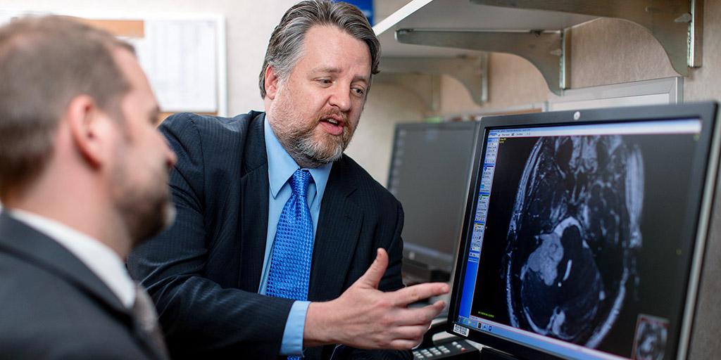 Mayo Clinic neurotologists discussing a case