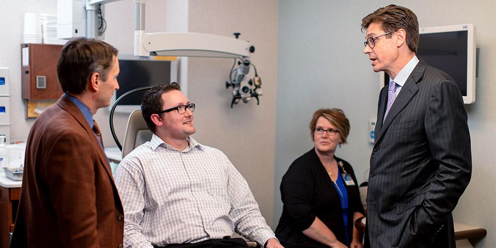 Mayo Clinic neurotologists consulting with a patient