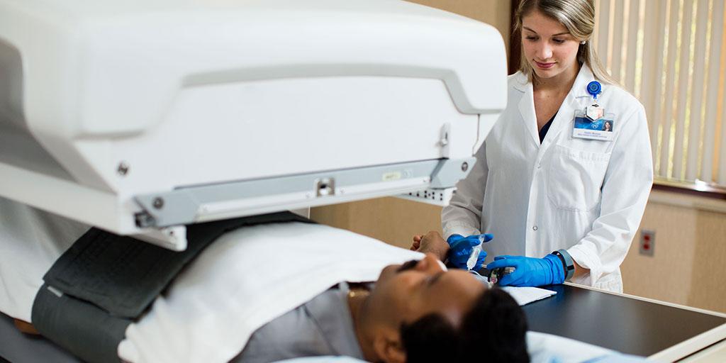 Photo of a Mayo Clinic nuclear radiology fellow performing a test