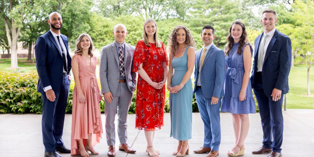 Alumni standing together