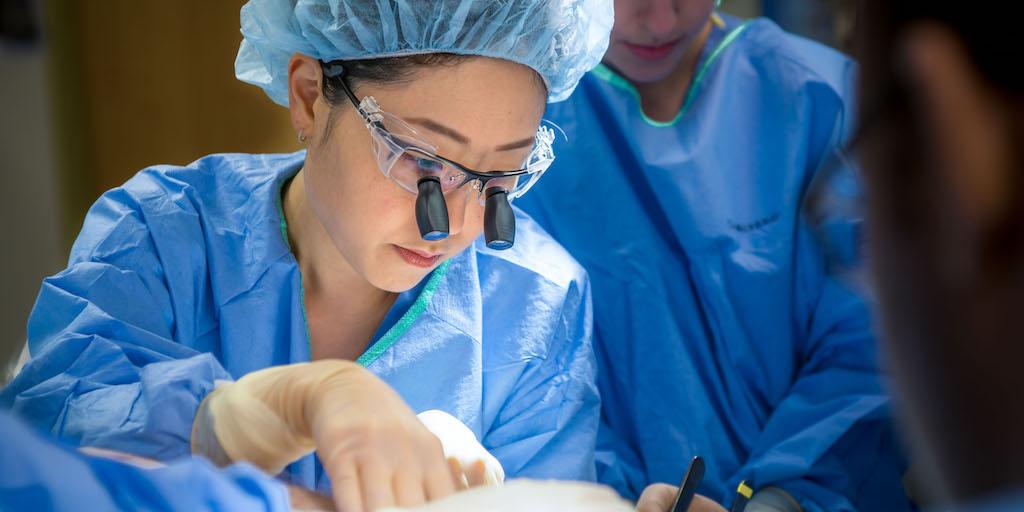 Plastic surgery resident working in the operating room at Mayo Clinic in Rochester, Minnesota.