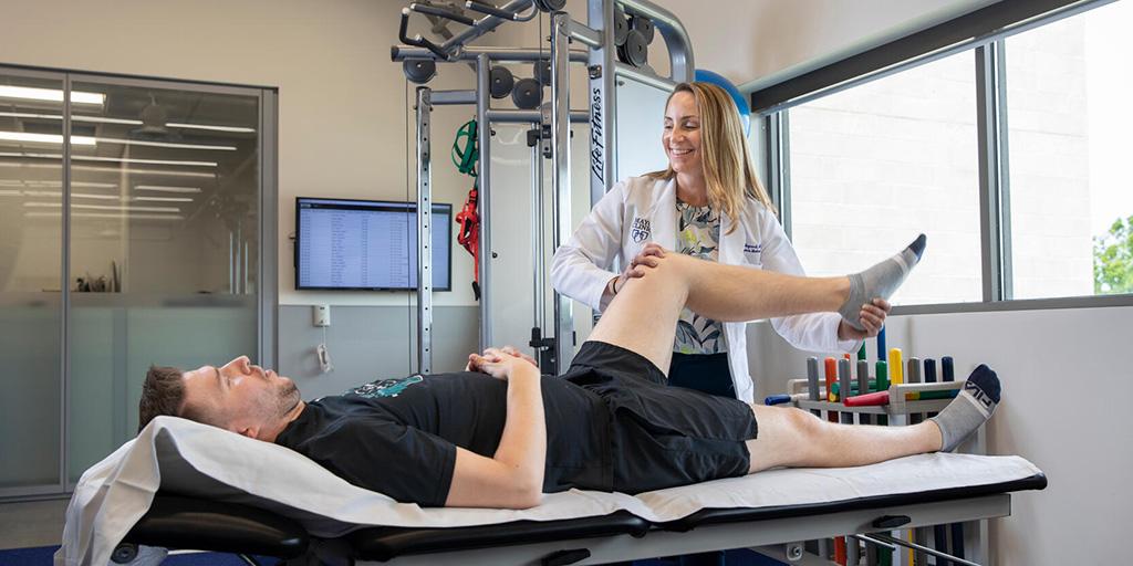 Primary Care Sports Medicine Fellowship program director, Jennifer Maynard, M.D., working with a patient.