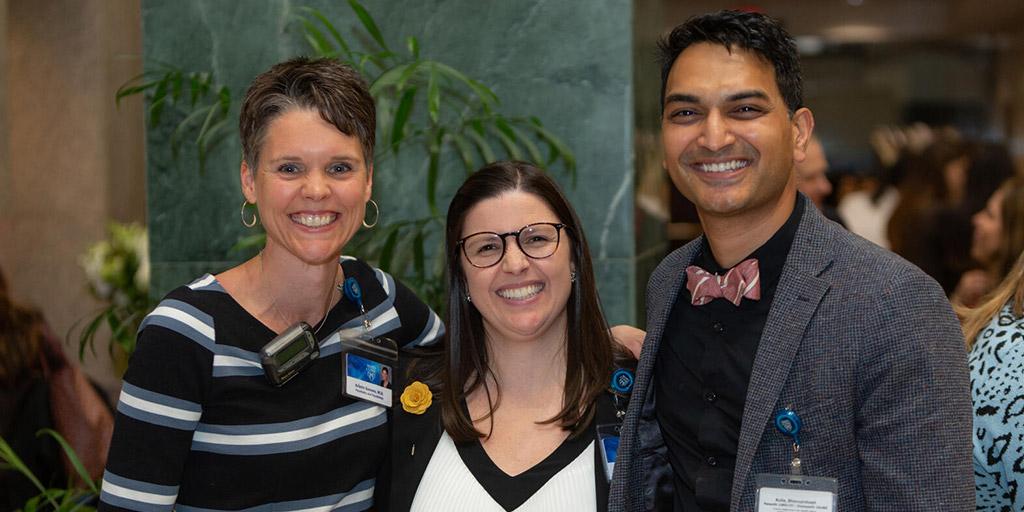 Psychiatry faculty pose together for a group photo at a conference.