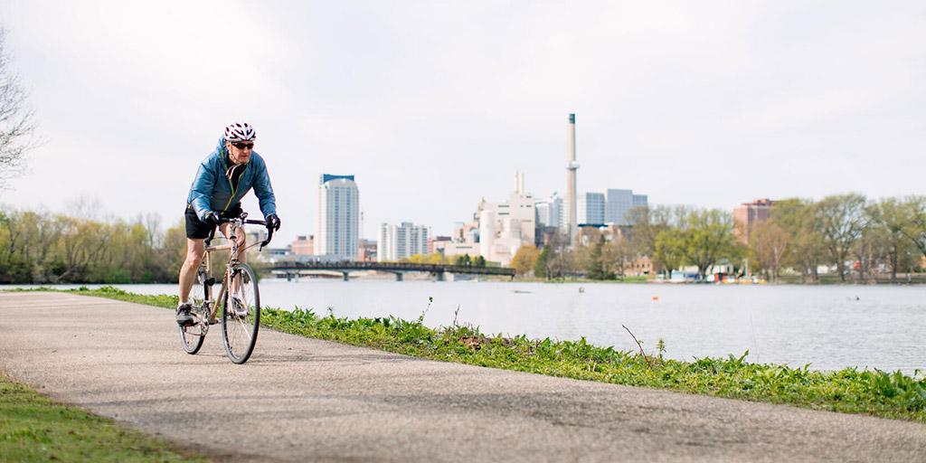 Mayo Clinic fellow riding bike on one of the many trails in Rochester, Minnesota.
