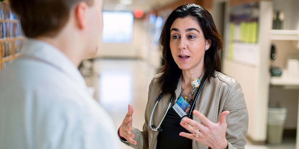 Mayo Clinic pulmonary consultant talking with a fellow