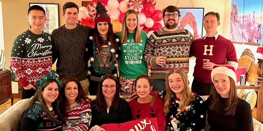 Radiation Oncology Residents meet together at the program directors home for a holiday celebration.