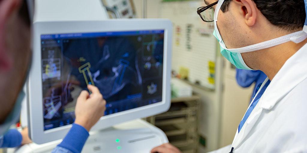 Mayo Clinic spine surgeons discussing a case