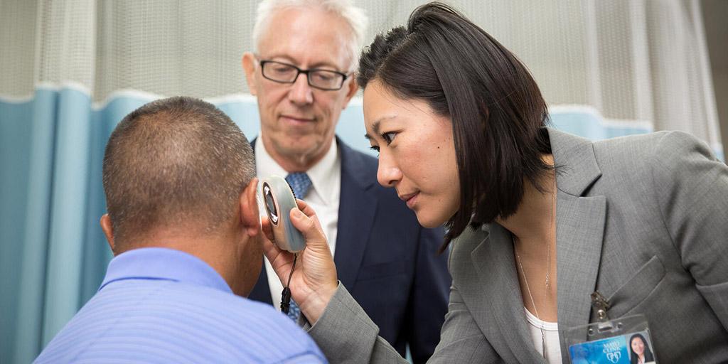 Dermatology fellows and faculty working with a patient at Mayo Clinic in Phoenix, Arizona.