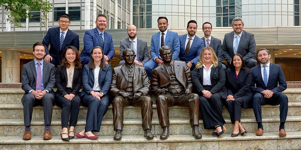 Group of 2024 graduates in outside in front of Mayo building.
