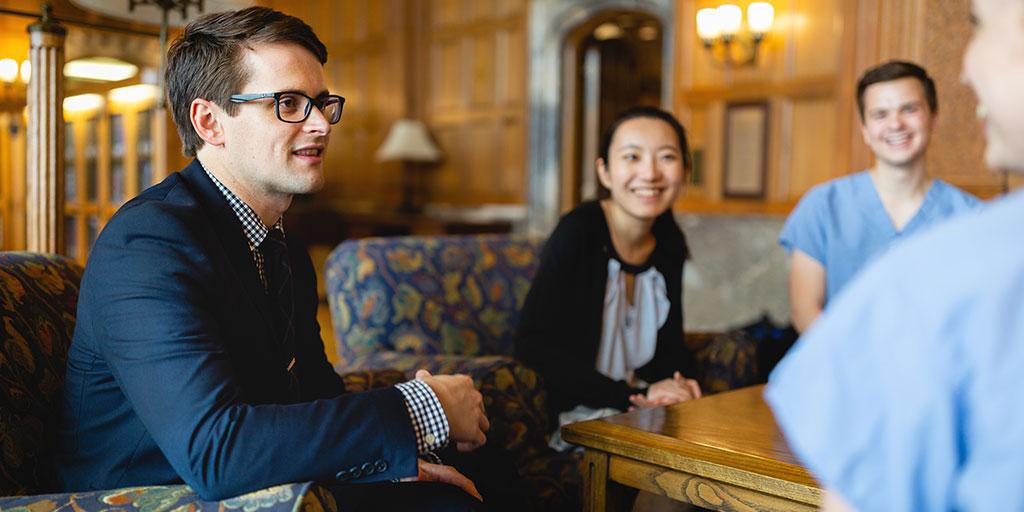 Students talking in library