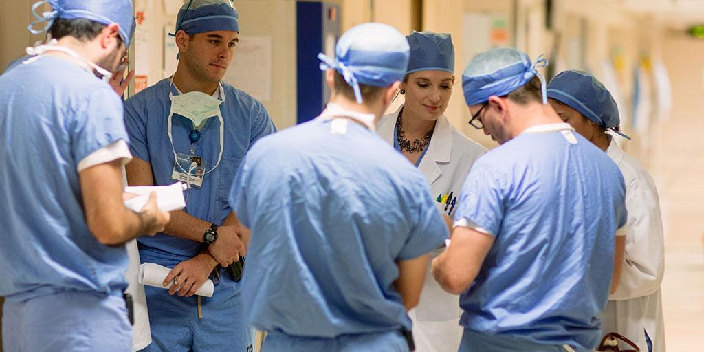 Residents preparing for morning rounds in hospital