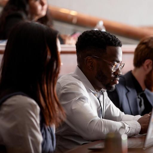 M.D. Students sit next to each other in a lecture hall at Mayo Clinic Alix School of Medicine in Rochester, Minnesota.