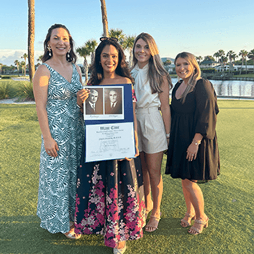Our 2024 fellow graduate, Shweta Srivastava, M.B.B.S., held their diploma and posed for a group photo. Photo (left-to-right): Kristin Robinson, M.D. (program director), Shweta Srivastava, M.B.B.S. (2024 fellow graduate), Michelle Verkamp (program coordinator), and Candice Maly (program coordinator).
