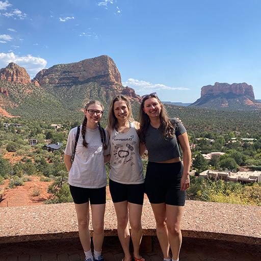 traveling in Arizona with M.D.-Ph.D. students Mylan Blomquist (left) and Skylar Rizzo.