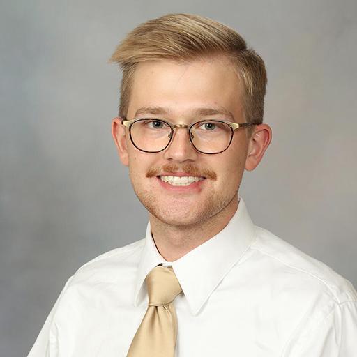 Headshot of Tavis Pugh, C.N.M.T.
