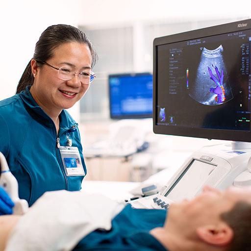 Mayo Clinic diagnostic medical sonographer conducting an ultrasound on a patient