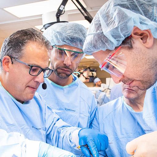 Adult reconstructive upper extremity surgeons in the operating room at Mayo Clinic in Rochester, Minnesota.
