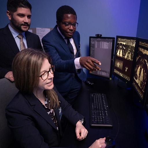 Body Imaging fellows look at imaging scans on computer screens at Mayo Clinic in Jacksonville, Florida.