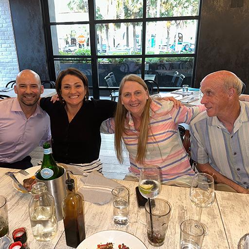 Cardiothoracic imaging members gathered around a table for a celebratory meal. Photo (left-to-right): Justin Stowell, M.D., Isabel Cortopassi, M.D., Patricia Mergo, M.D. (program director).
