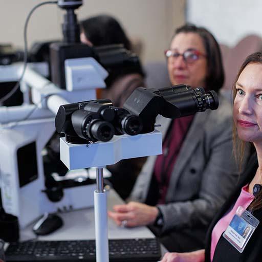 Doctors in the cytopath program use modern equipment to examine samples.