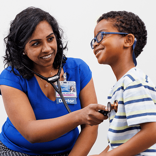 A Family Medicine resident with a young patient