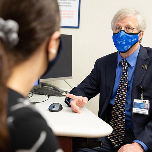 Gastroenterology fellow working with a patient at Mayo Clinic in Jacksonville, Florida.