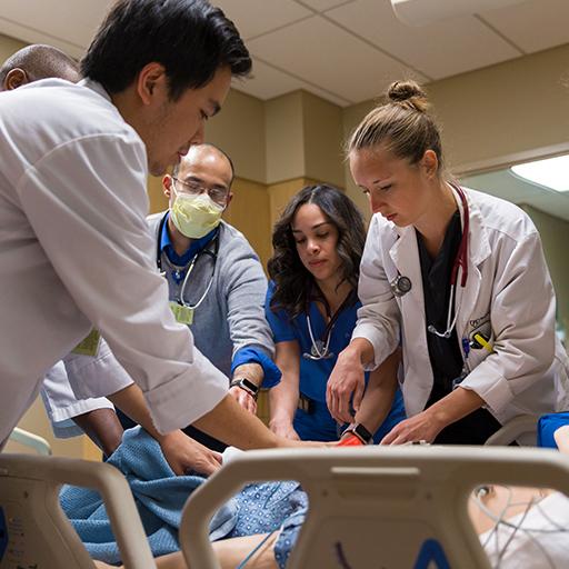 Internal Medicine residents practice their skills in the lab.
