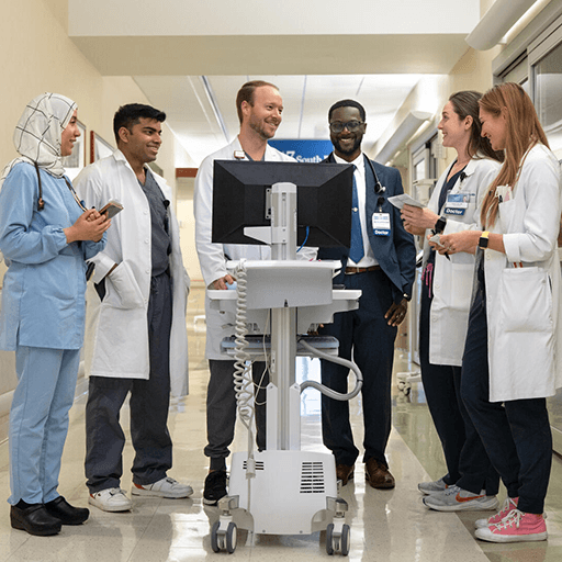 Residents and physicians in rounds