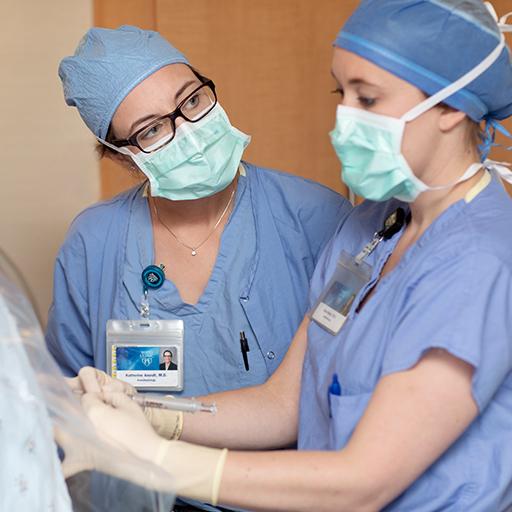 An obstetrics patient receives an epidural block.