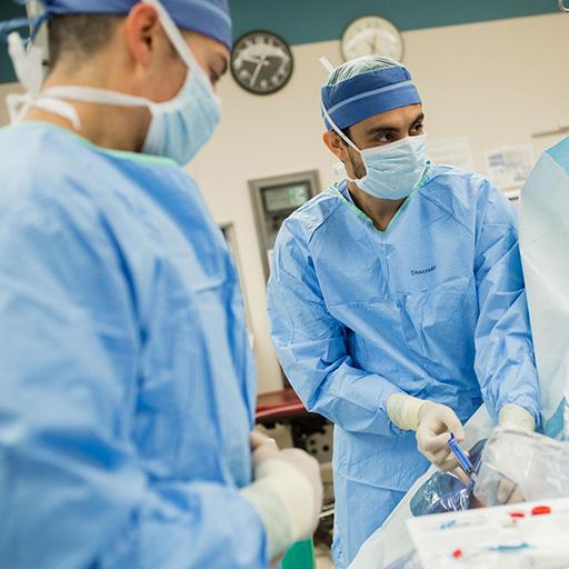 Two anesthesiologists working.