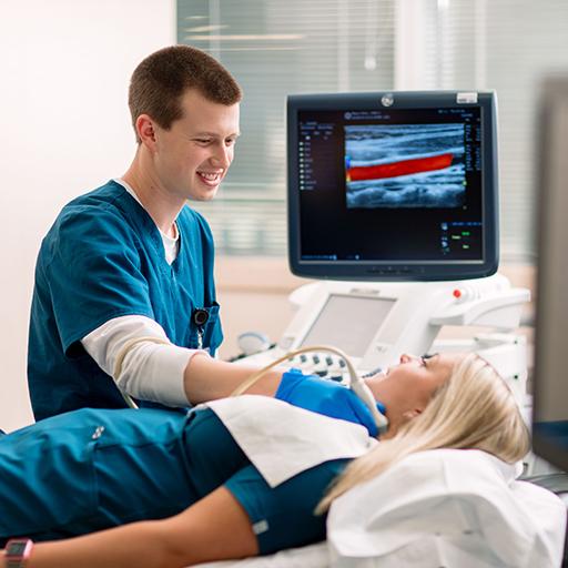 Student using ultrasound