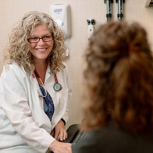 Provider speaks with a patient at Mayo Clinic.