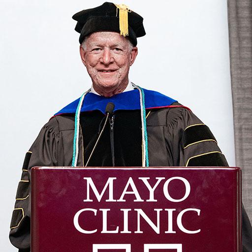 Michael Huckabee, Ph.D., Associate Director of the PA Program and the founding director, speaks at the PA program graduation ceremony