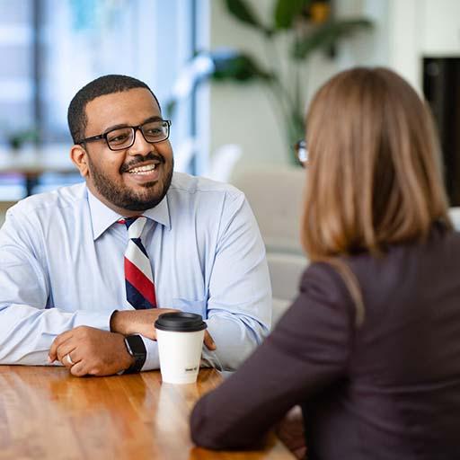 Two individuals in a meeting
