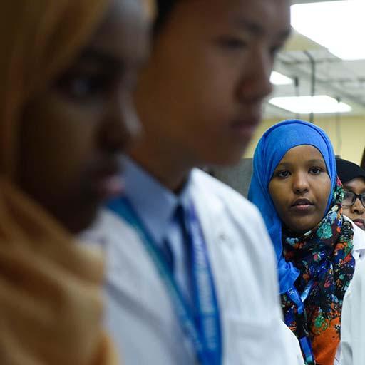 Students in the RISE for Youth program watch their teacher