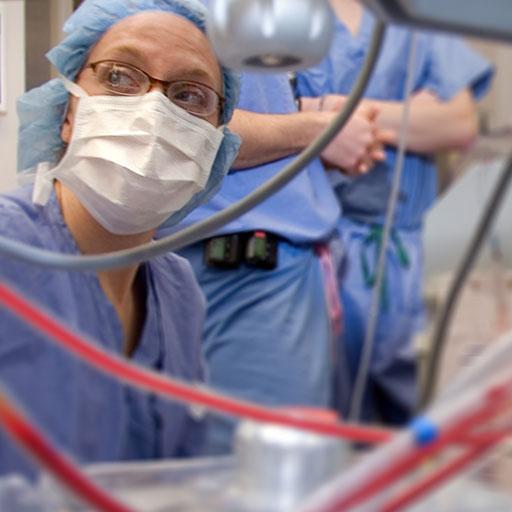 Mayo Clinic cardiovascular perfusionist monitoring a patient in an operating room