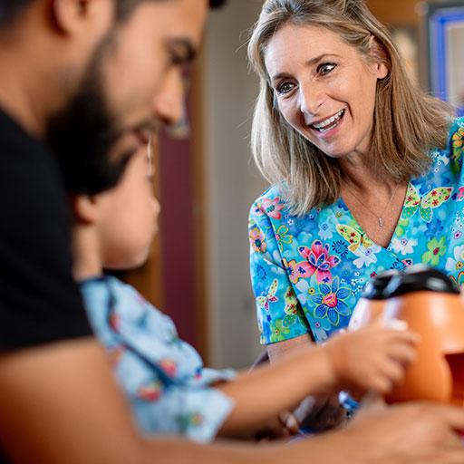 Mayo Clinic child life specialist playing with toys with a child