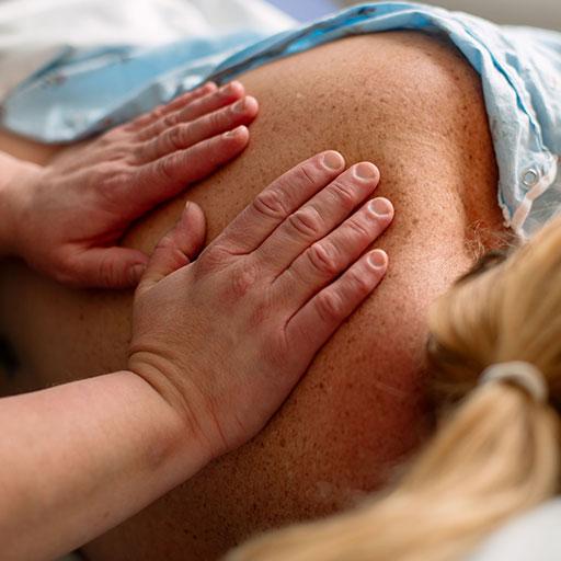 Mayo Clinic medical massage therapist treating a patient