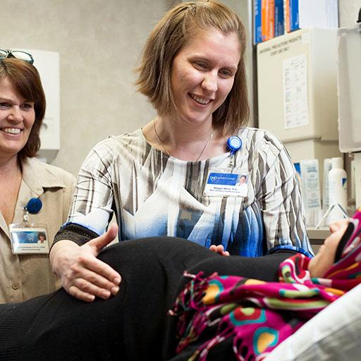 Mayo Clinic nurse midwives examining a pregnant patient